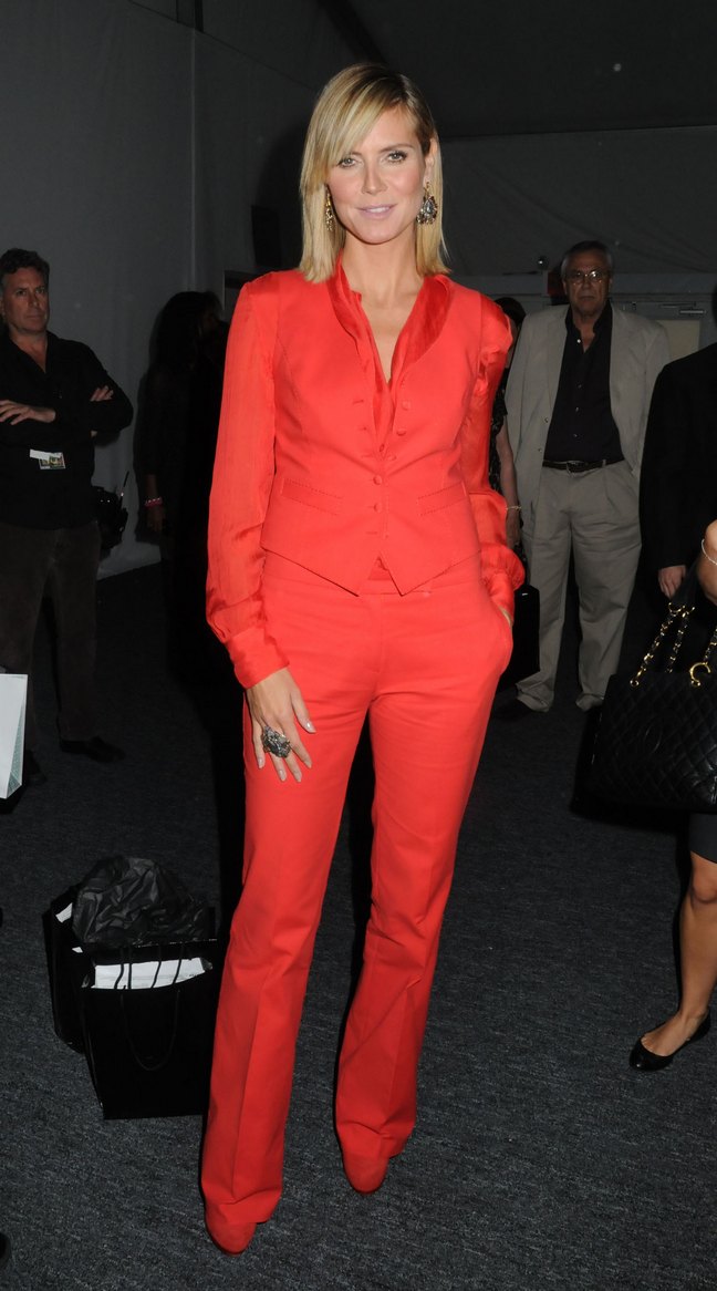 Heidi Klum, red suite, red shoes, large ring, earrings, fashion week, project runway